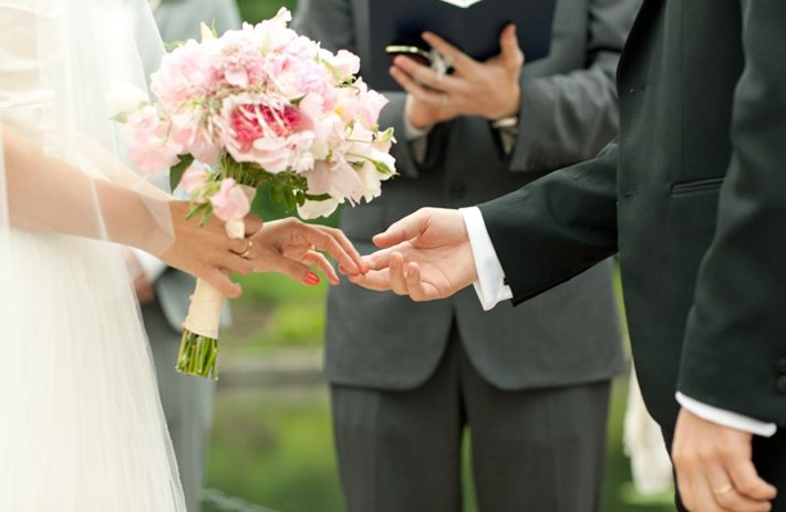 Wedding Vows - Couple At Altar